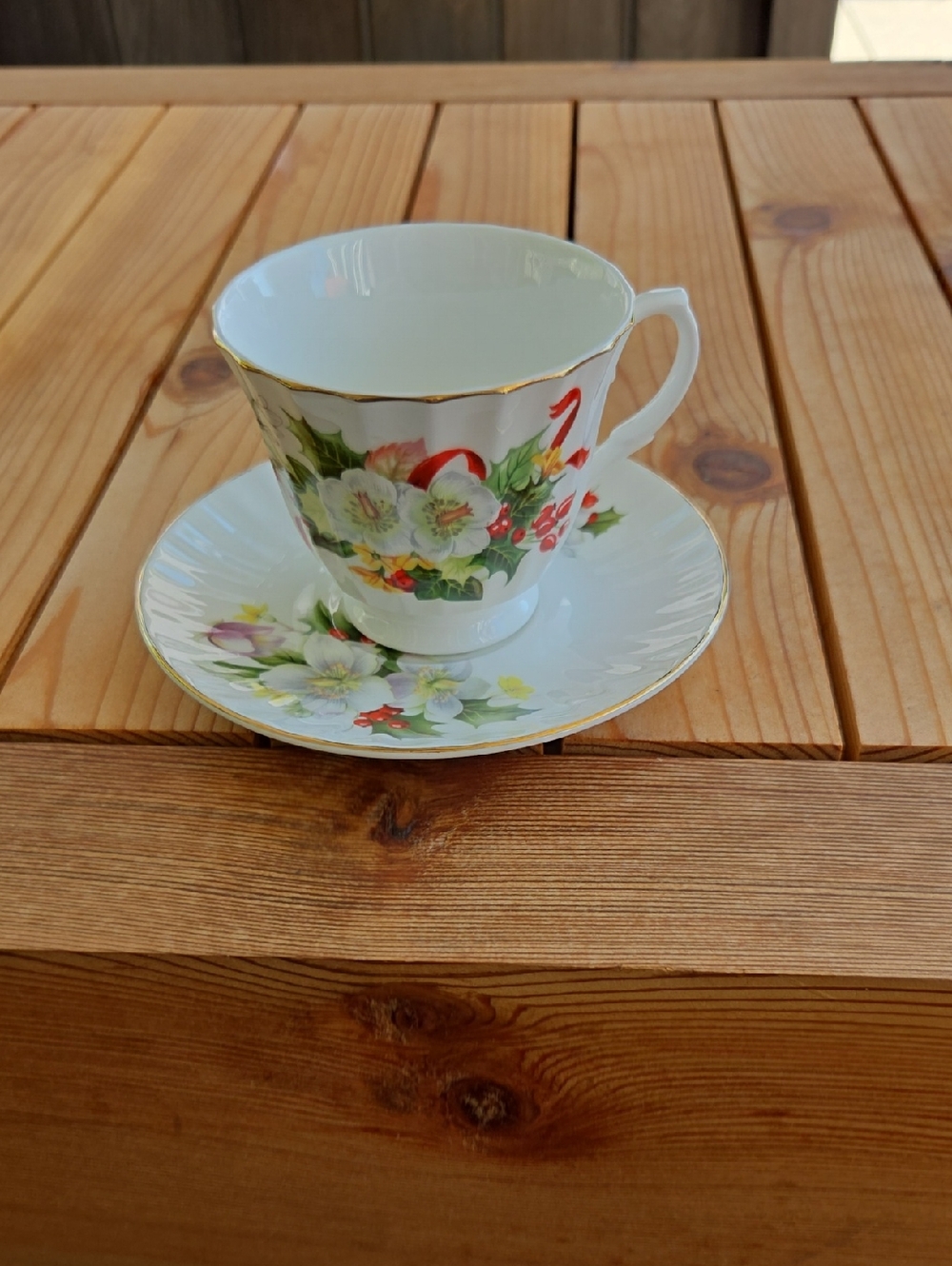 Floral Bone China Teacup and Saucer with Gold Trim By Royal Victorian